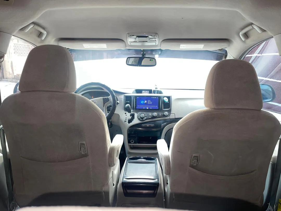 Toyota Sienna front cabin and dashboard screen seen from the second row